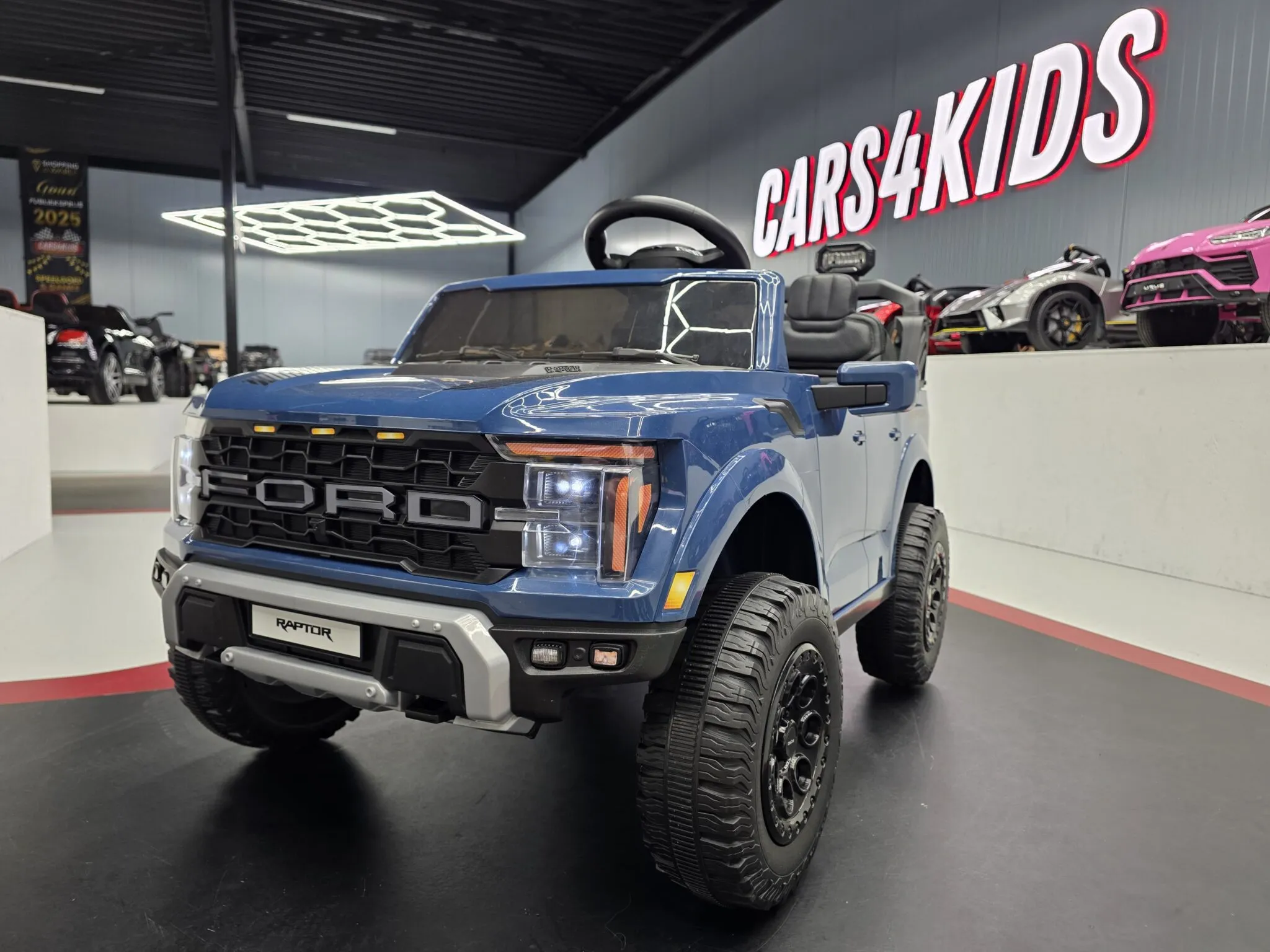 Elektrische-kinderauto-Ford-Raptor-2-persoons-blauw Električni dječji automobil Ford Raptor s 2 sjedala, 24 volta, plavi - Slika 1